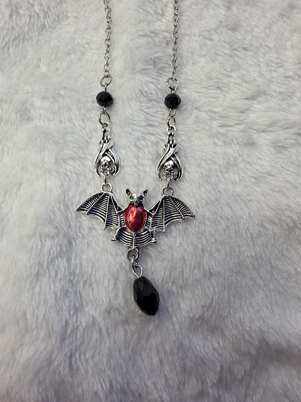 Silver Bat Necklace with Red Gem and Black Beads